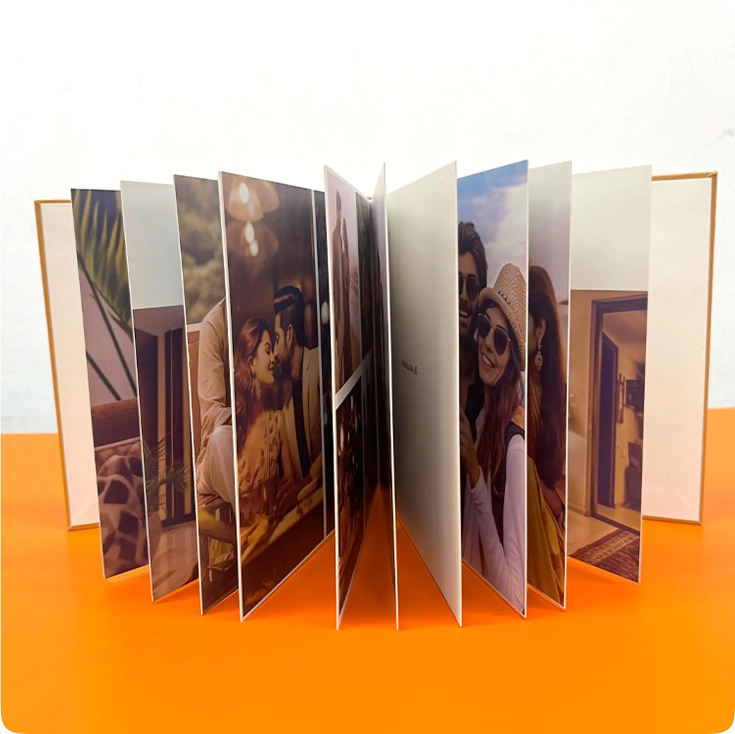Color Kahar (colorkahar) square layflat leather cover photobook — accordion pages fanned out multiple couple photos personalized Pakistan