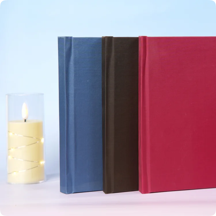 Color Kahar (colorkahar) square layflat linen cover photobooks — navy blue brown red three colors stacked personalized Pakistan